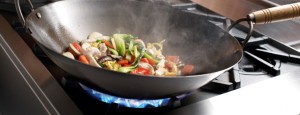 Wok cooking on a BlueStar Freestanding Range