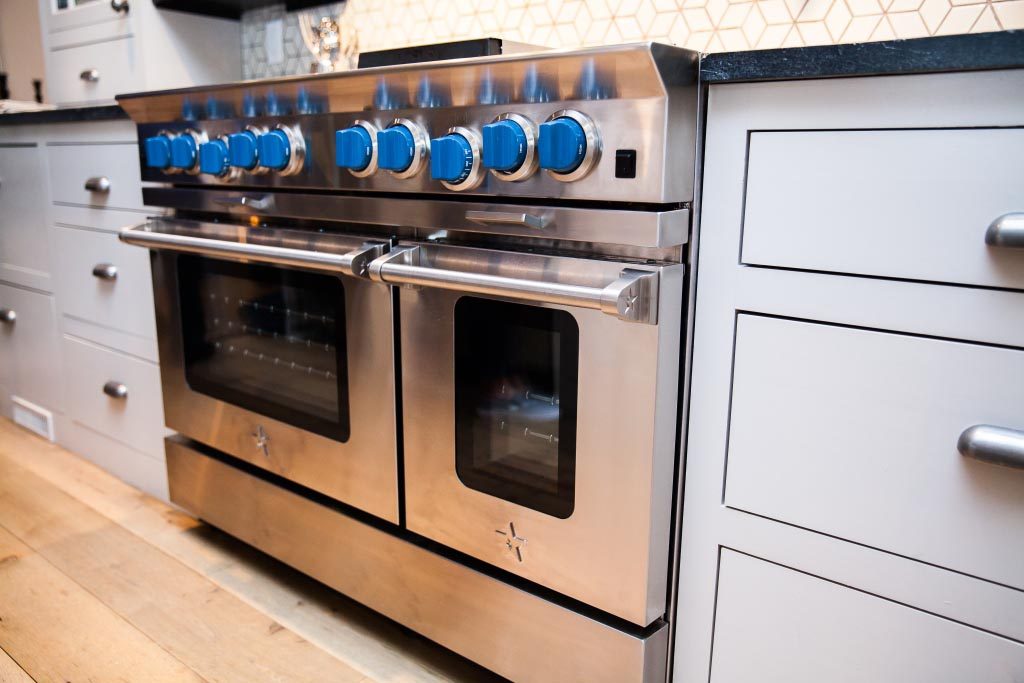 Chef Ford Fry's 48" Platinum Series Range with Azure Blue Knobs