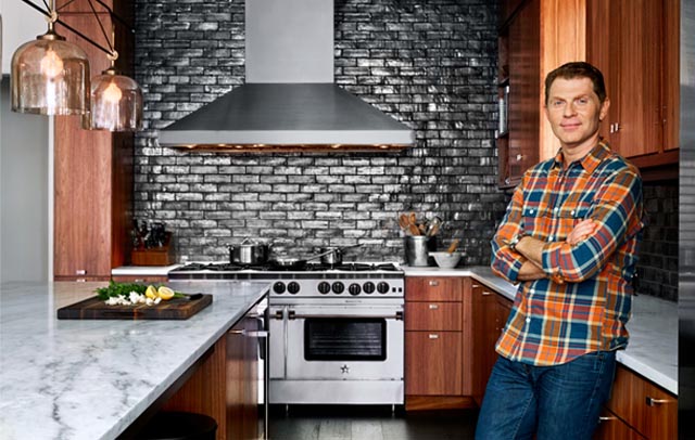 Chef Bobby Flay in his NYC kitchen featuring a 60" BlueStar range