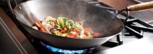 Integrated wok cooking on open burner ranges from BlueStar